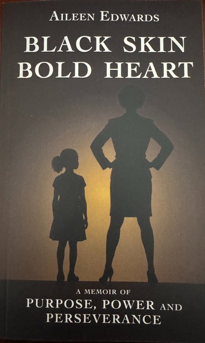 Cover of Black Skin Bold Heart: silhouette of a young Black girl looking up at her future self, an accomplished HR Leader, as she stares into a shining light.